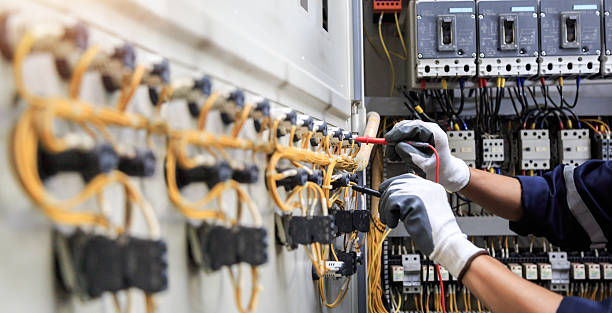 Professional Electrician technician working in Robertsdale, AL